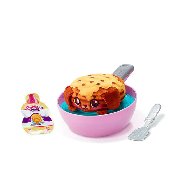 Cookeez Makery S2 Pancake Treatz Playset with interactive plush pancake and cooking accessories in a pink bowl.