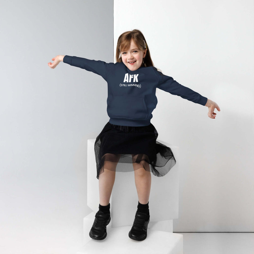 AFK Kids eco hoodie worn by a child, showcasing comfort and style in a cozy setting.