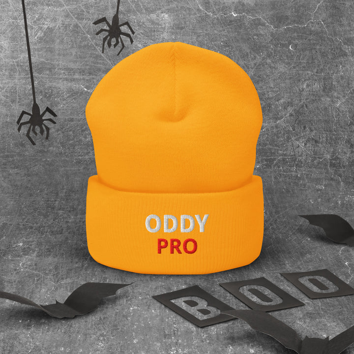 Oddy Pro Cuffed Beanie in orange, featuring bold white embroidery, perfect for stylish warmth.
