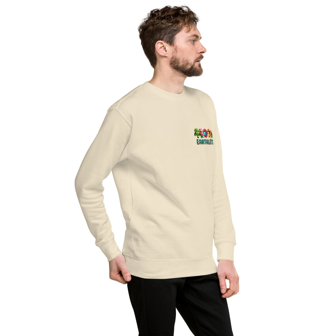 Man wearing Earthlets unisex premium sweatshirt in cream color, showcasing vibrant graphic design on the front.