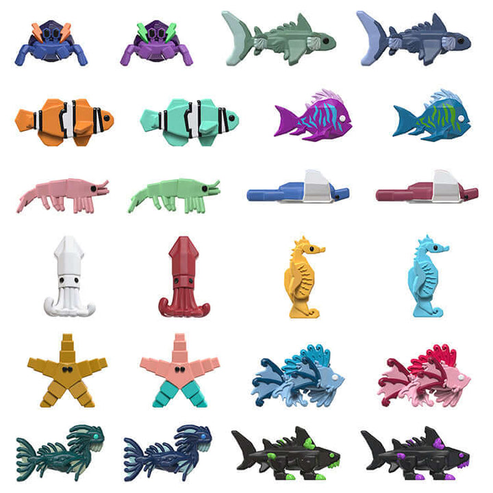 Colorful assortment of Fisch Series 1 microfigures including sharks, seahorses, and starfish in vibrant designs.