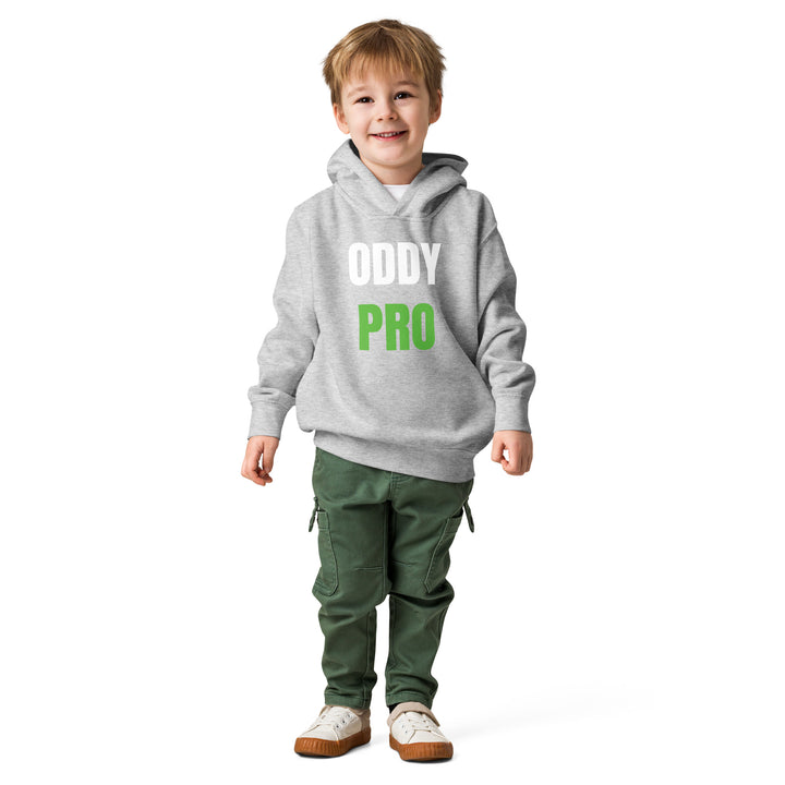 Oddy Pro Toddler fleece pullover hoodie worn by a smiling boy in a gray hoodie and green pants.