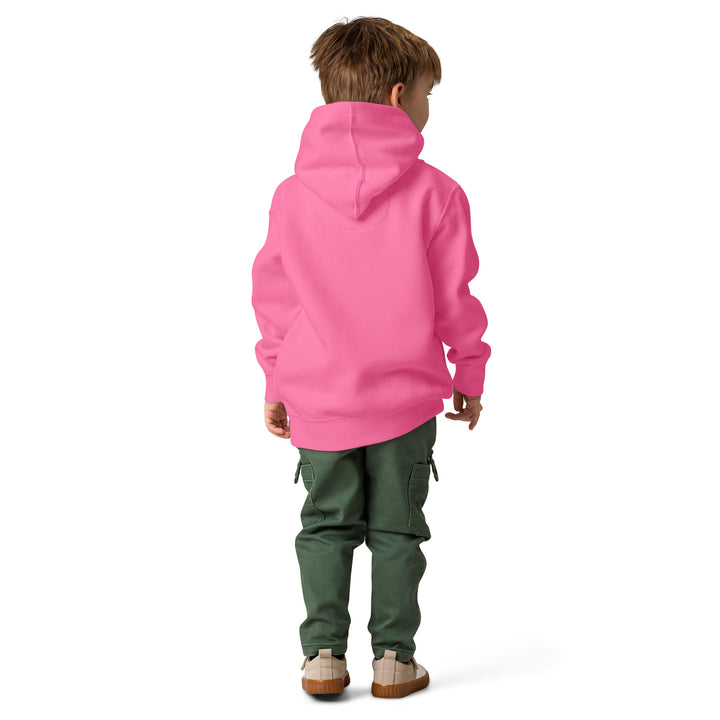 Boy wearing Oddy Pro Toddler fleece pullover hoodie in pink from the back, paired with green pants.